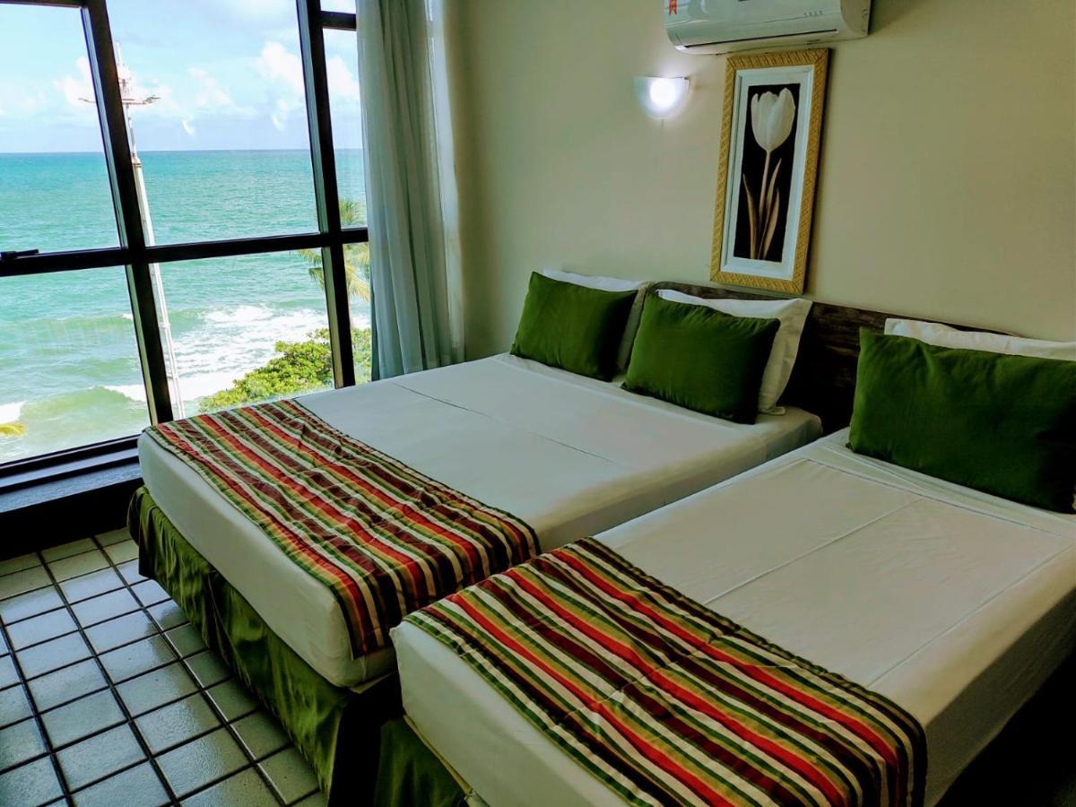 Quarto Triplo com Vista Mar